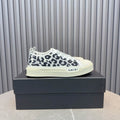 AMIRI Court Low – White / Black Leopard